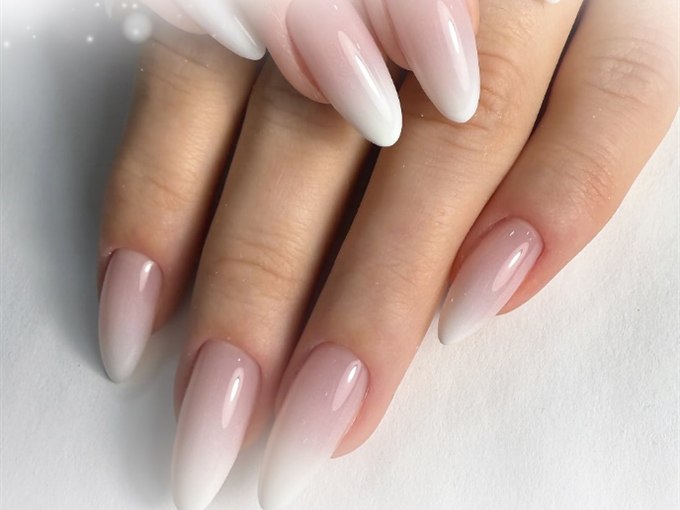 Baby boomer ombré French manicure on long almond nails