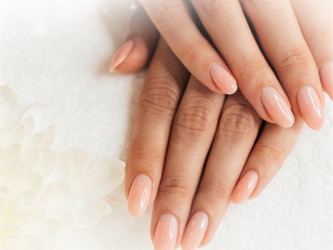 Nude manicure with a polished spa finish